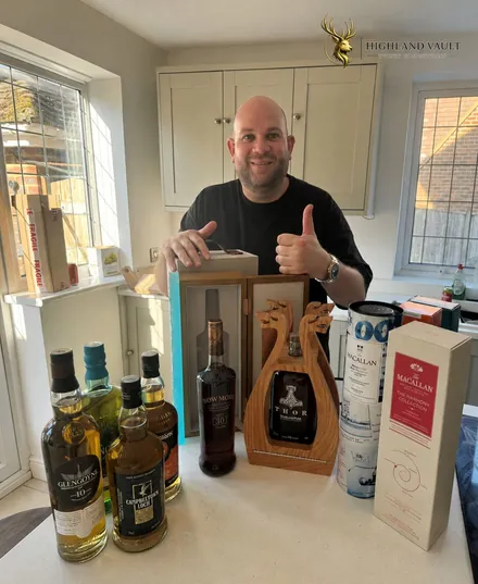A Highland Vault winner with their whisky bundle